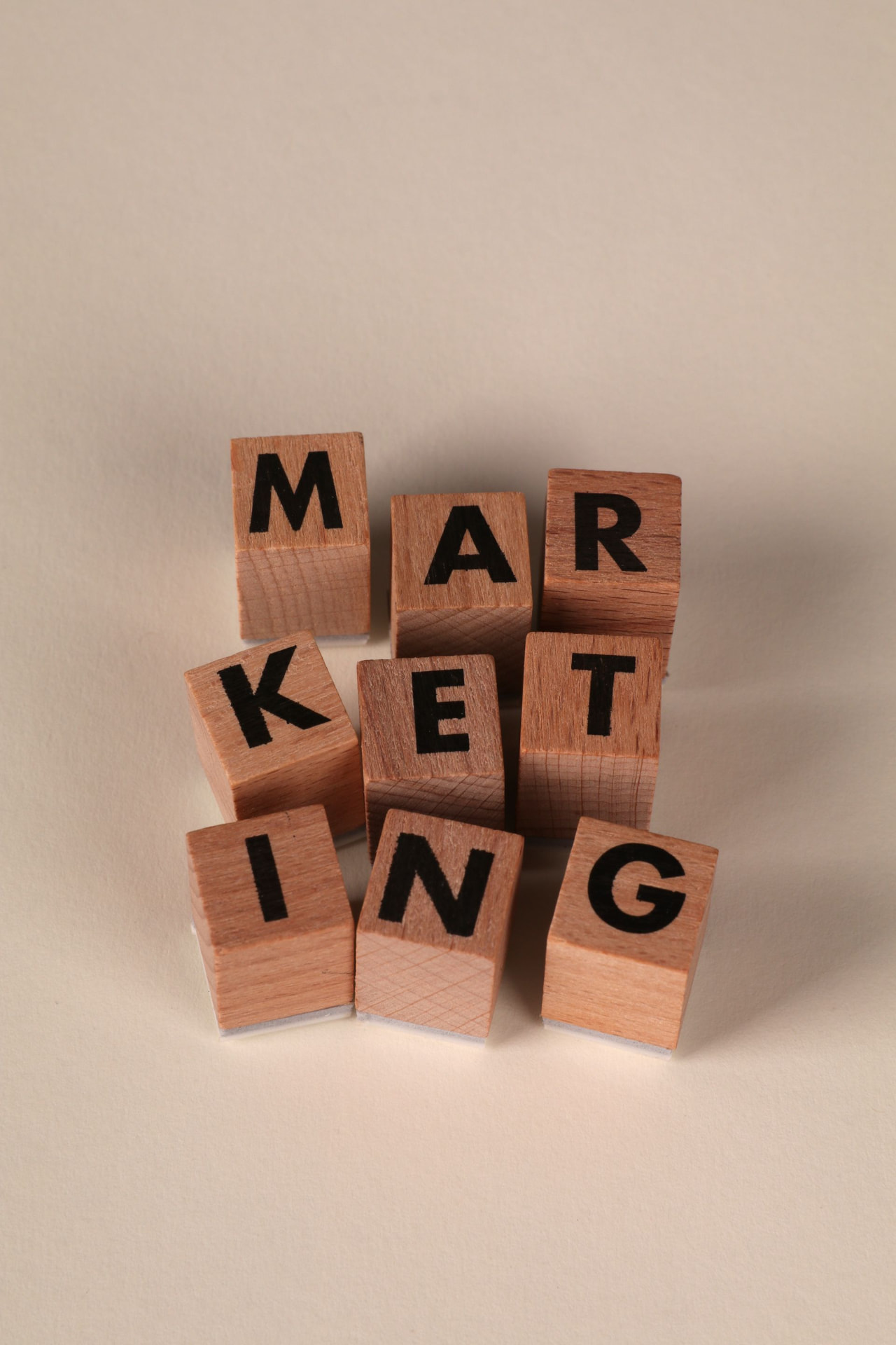 Wooden letter blocks spelling the word marketing